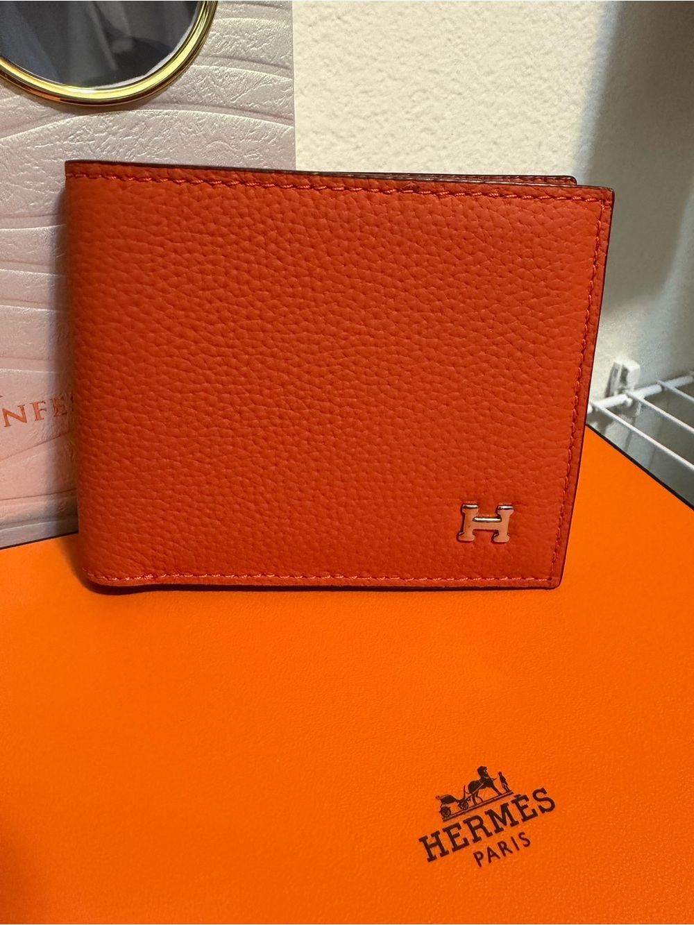 Hermes Orange Grained Leather Men's Wallet with Silver H Accent